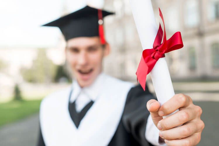 a student happy at his graduation ceremony