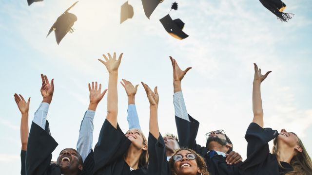 high school students getting graduated